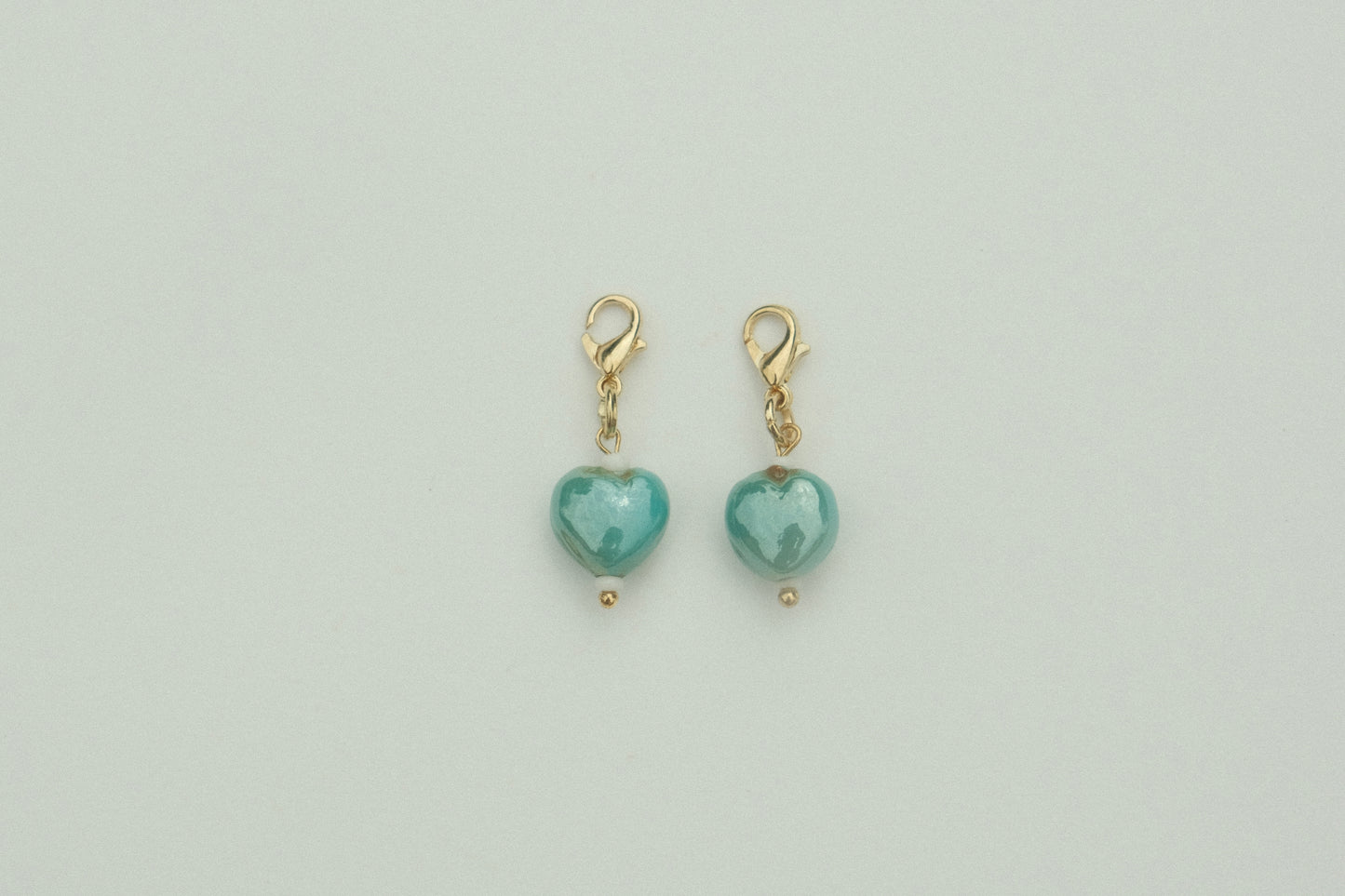 Teal heart charm