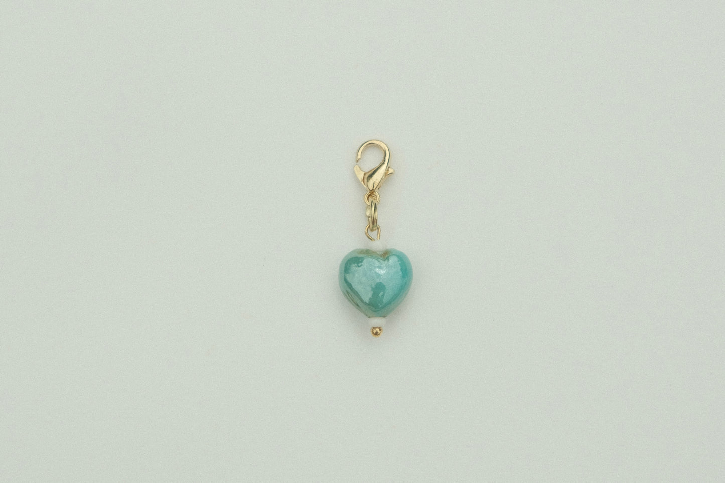 Teal heart charm