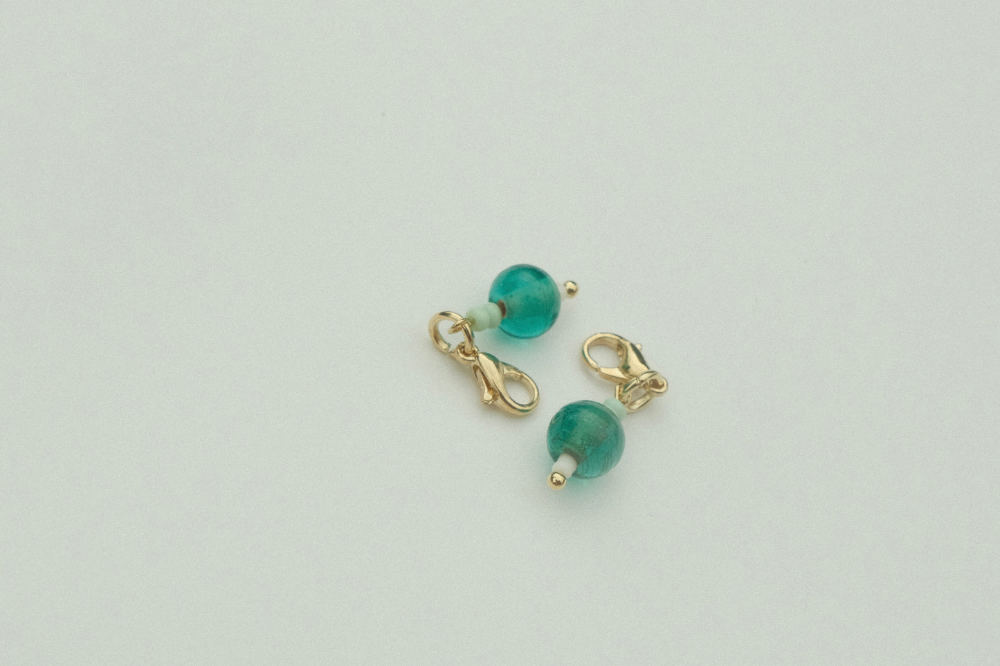 Teal droplet charm